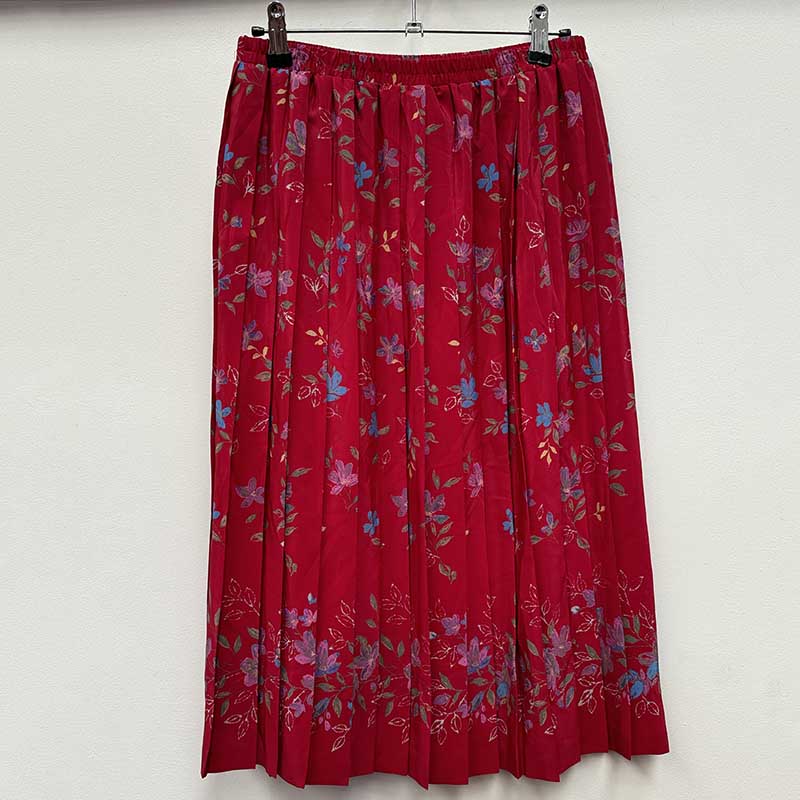 wholesale job lot of midi and knee length skirts - red pleated skirt, example of what you might receive