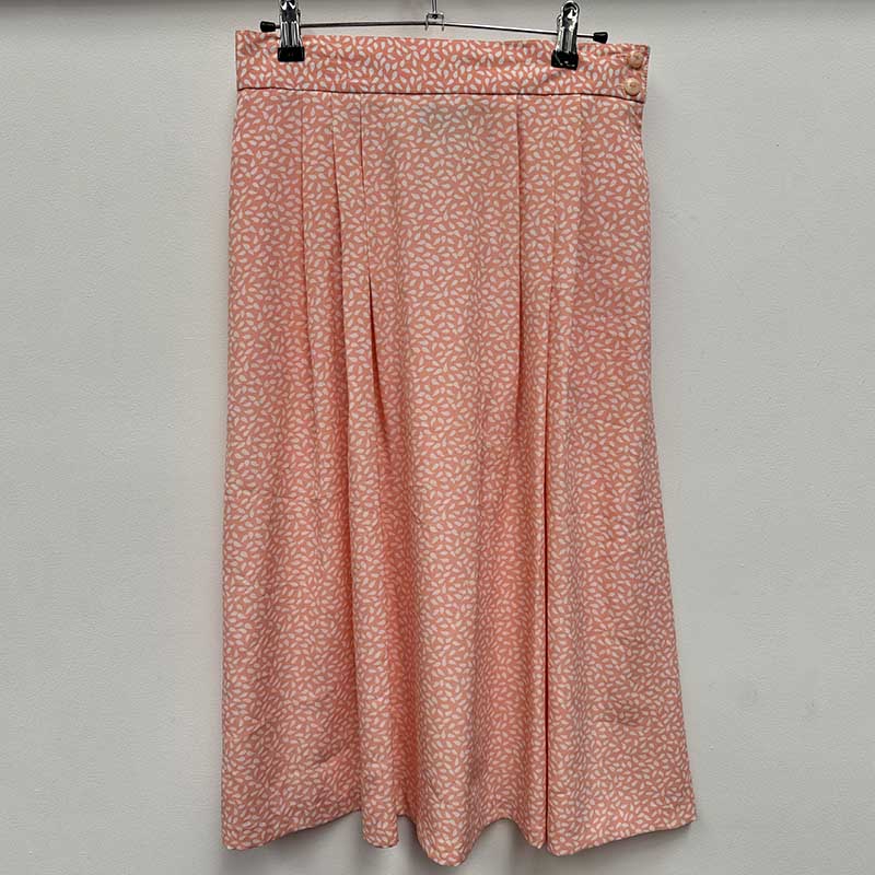 wholesale job lot of midi and knee length skirts - salmon pink polka dot skirt, example of what you might receive