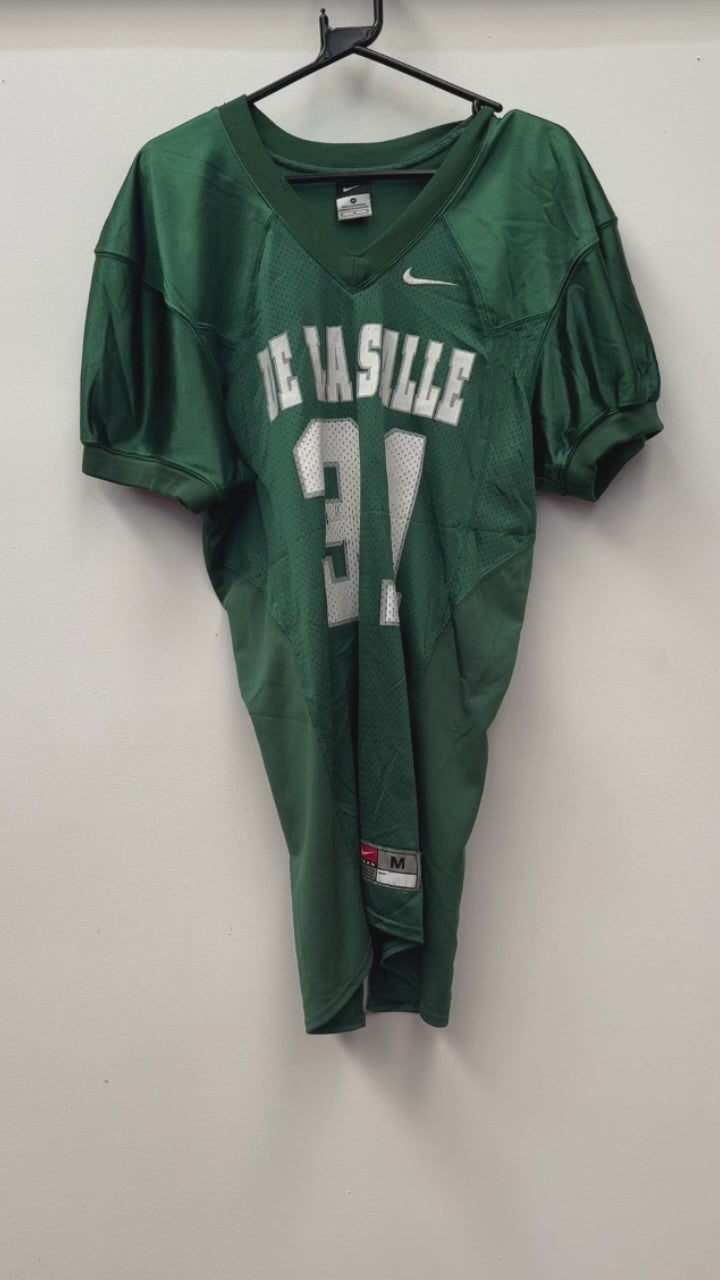 Unboxing of our Grade B USA sports jerseys wholesale bundle showing vintage basketball, football, baseball, hockey, and varsity tops