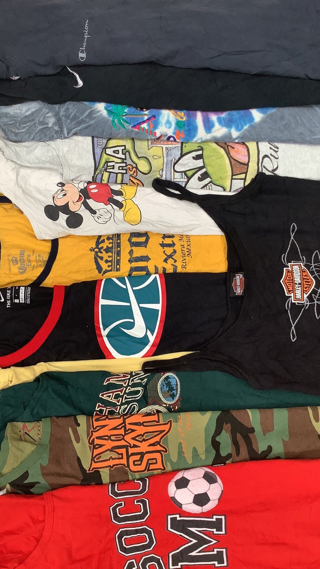Wholesale vintage and secondhand branded sportswear vests bundle with Harley Davidson, Nike, Champion and more in bulk order with international delivery