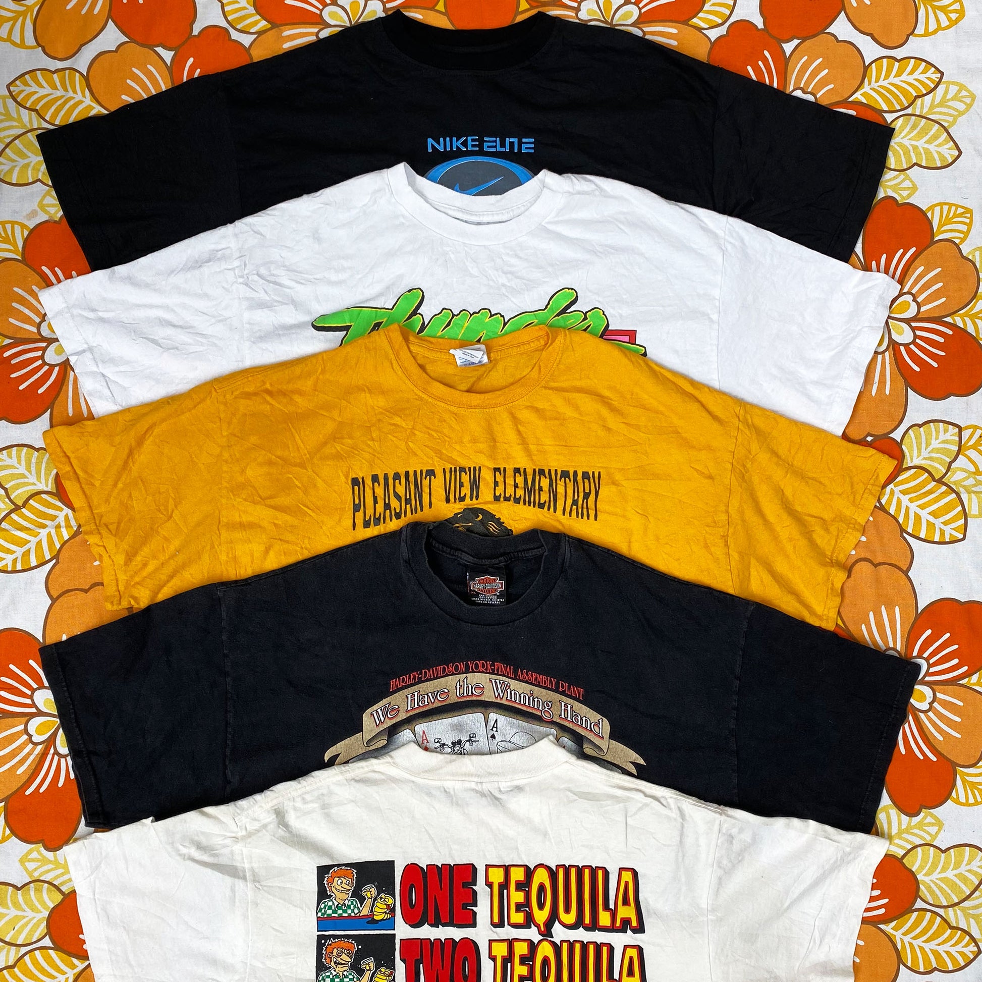 Wholesale vintage and secondhand mixed bundles of printed, graphic, sports and branded T-shirts. Choose from Grade A, B or ungraded to bulk buy per kilo, piece or bale. Handpick available in Sussex warehouse of Brighton's biggest vintage retailer or shop at monthly kilo sale events.