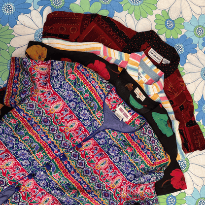 Short Sleeve Blouses Wholesale Bulk Bag 25kg 4 blouses example on flowery background