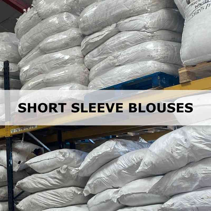 Stacks of white bags in a warehouse with 'Short Sleeve Blouses' text overlay.