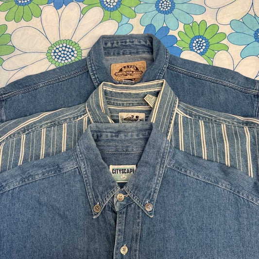 three denim shirts on a flowery background