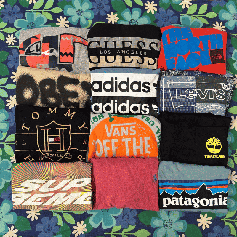 Collection of various branded t-shirts on a floral background