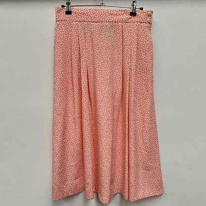 wholesale job lot of midi and knee length skirts - salmon pink polka dot skirt, example of what you might receive
