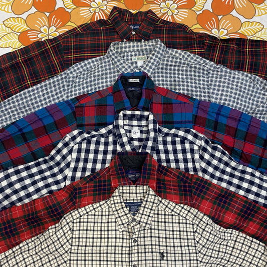 Wholesale vintage and secondhand mixed bundles of flannel shirts. Choose from Grade A, B or ungraded to bulk buy per kilo, piece or bale. Handpick available in Sussex warehouse of Brighton's biggest vintage retailer or shop at monthly kilo sale events.